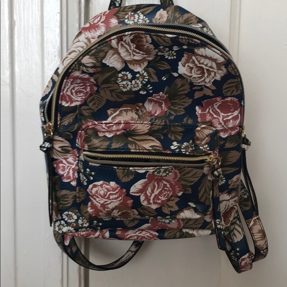Mini backpack with floral pattern